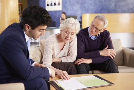Senior Couple Meeting With Consultant